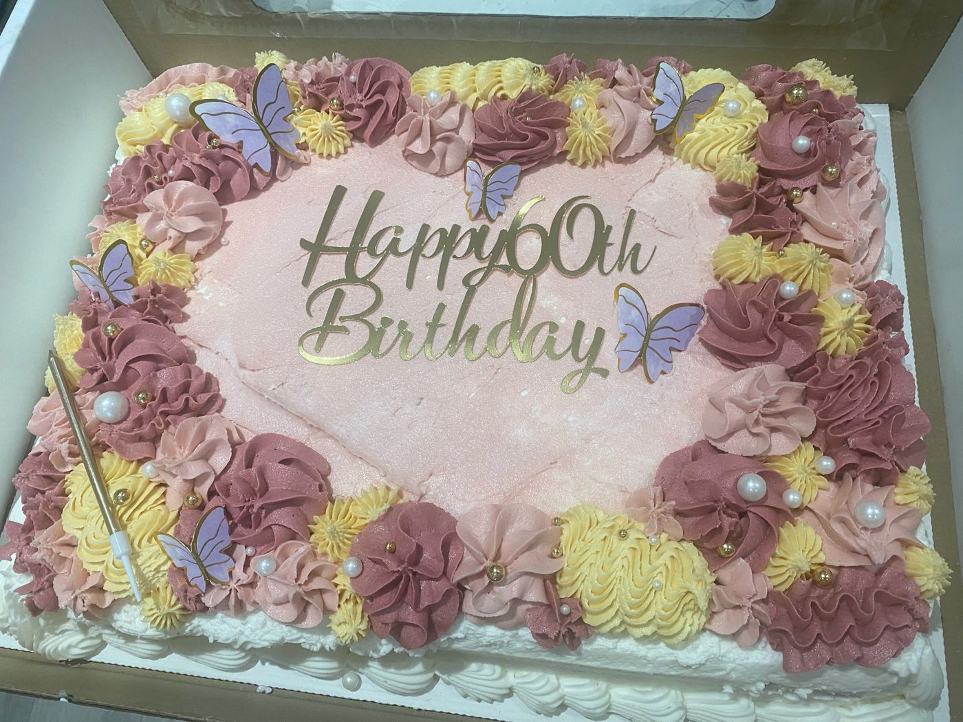 A floral 90th birthday sheet cake